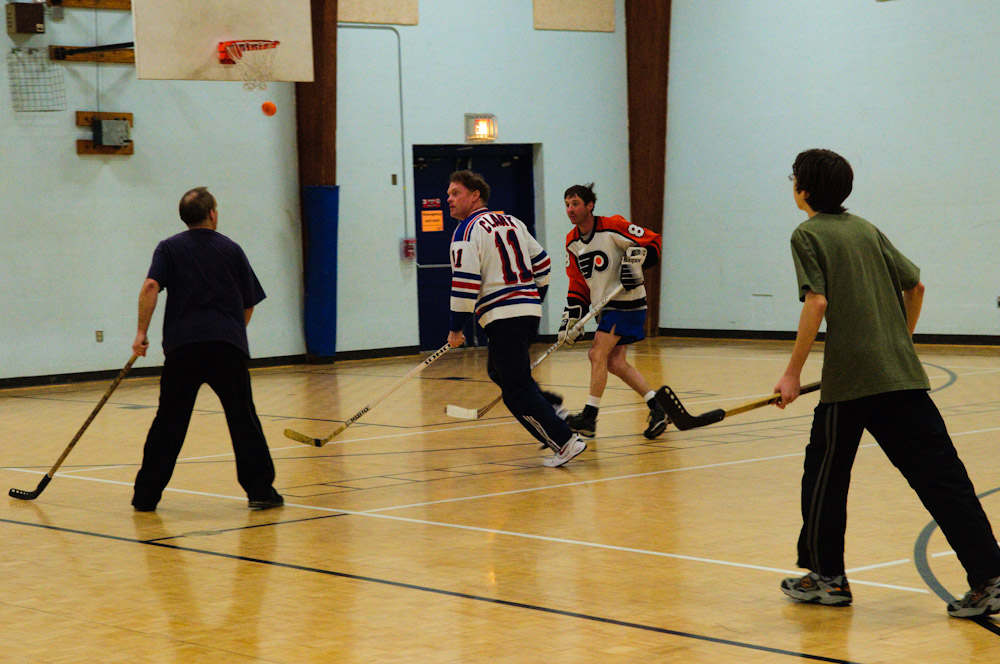 men playing hockey